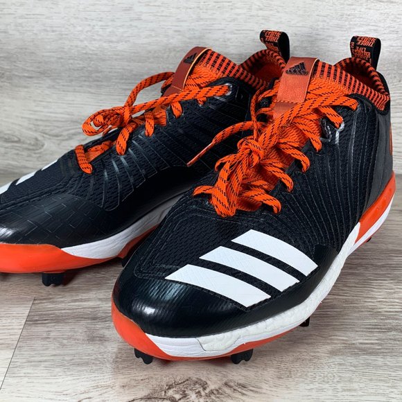 black and orange baseball cleats